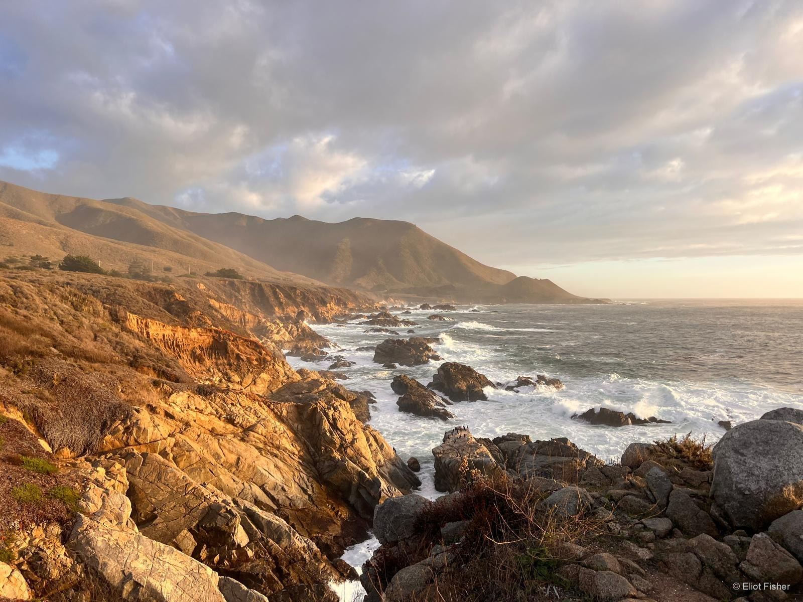 Eliot Fisher’s photograph of the California coast in warm evening light